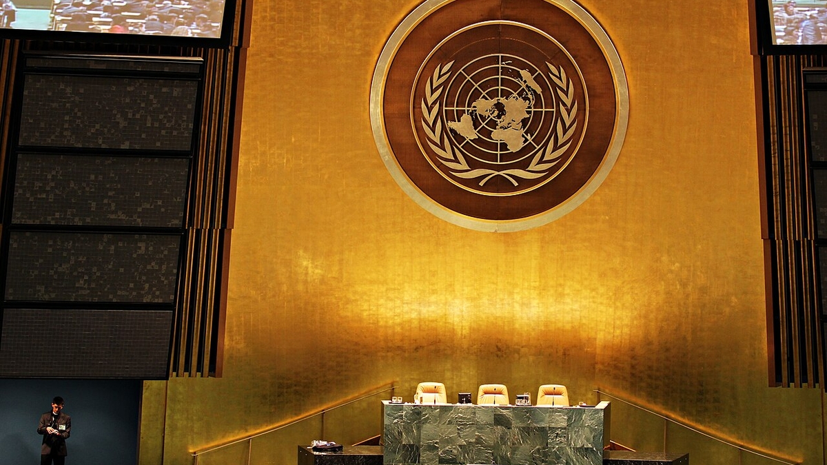 United Nations General Assembly Hall emblem above the dais